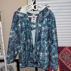 Blue waterproof jacket with abstract pattern